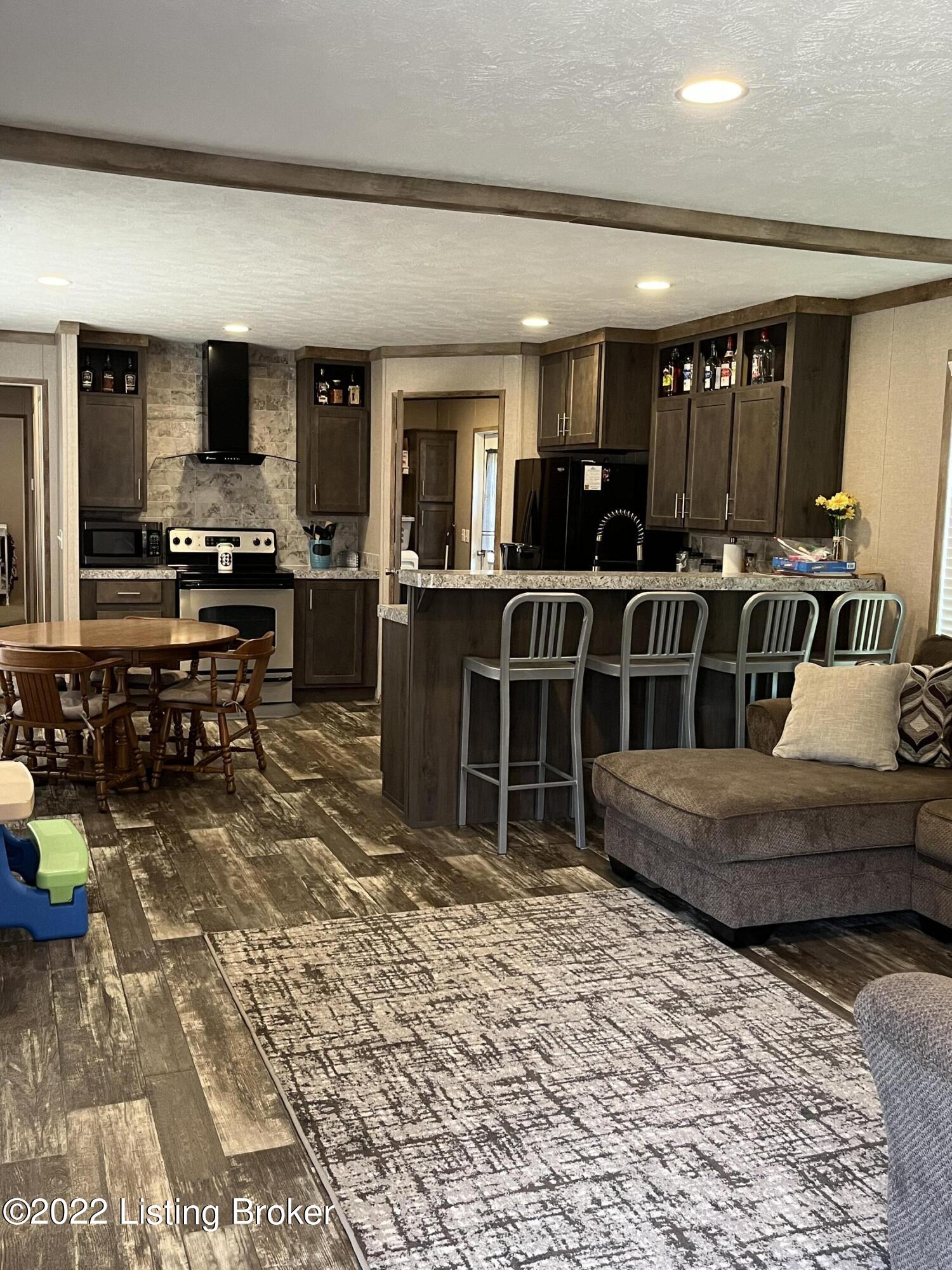 960 Nolin Park Road Clarkson, KY 42726 - Photo 7 of 24 KITCHEN HAS COUNTER BAR