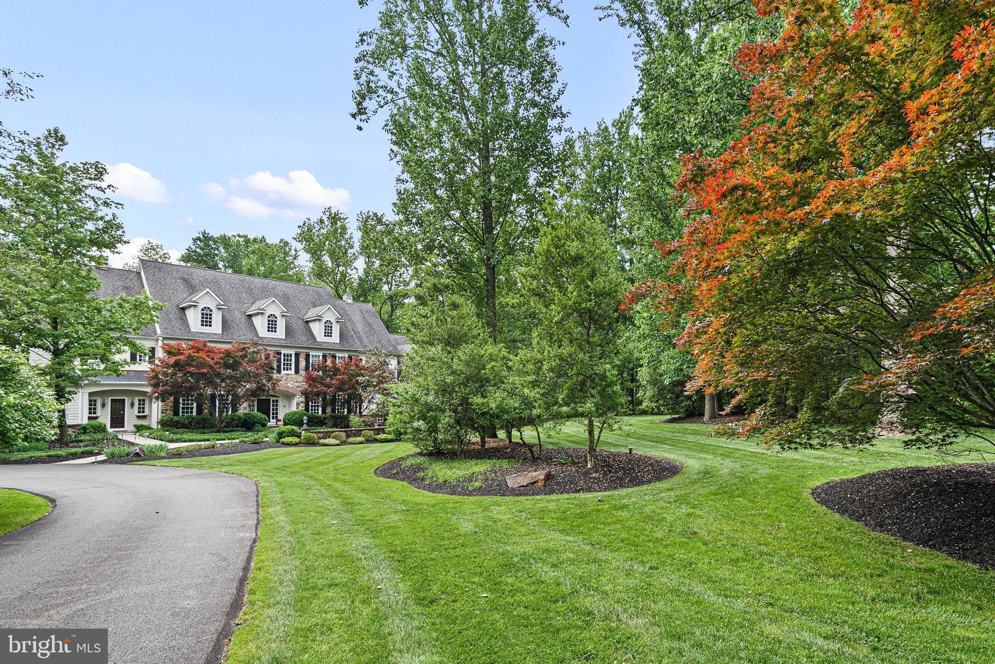 104 Timber Ridge Lane Chadds Ford, PA 19317 - Photo 3 of 65 a view of a big house with a big yard and potted plants