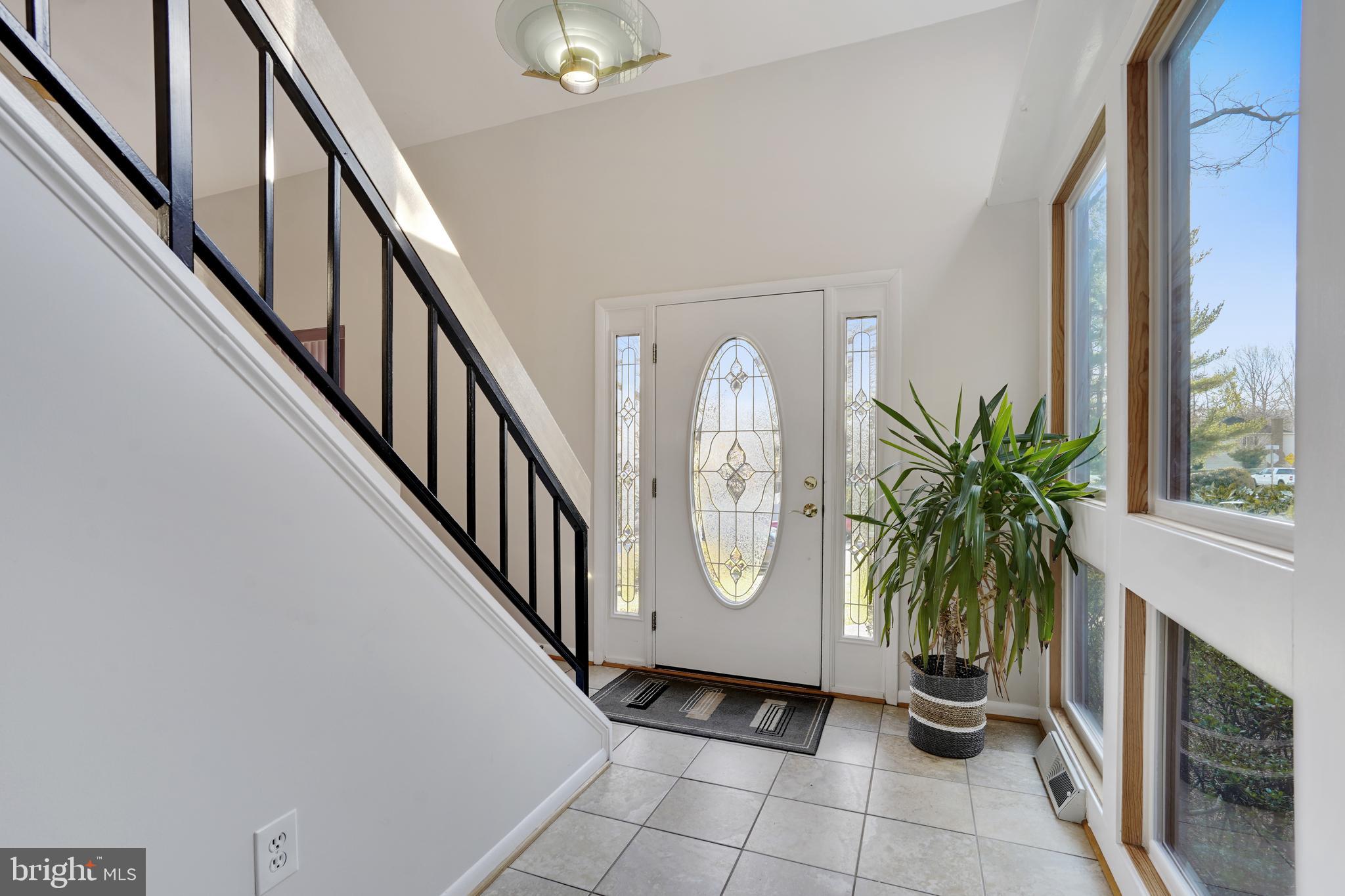 11828 Blue Spruce Road Reston, VA 20191 - Photo 22 of 45 Natural light floods the Hallway