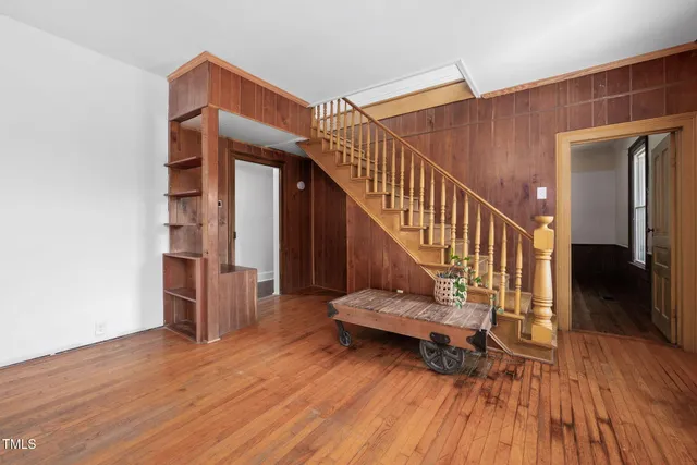 a bathroom with a sink a toilet and a window