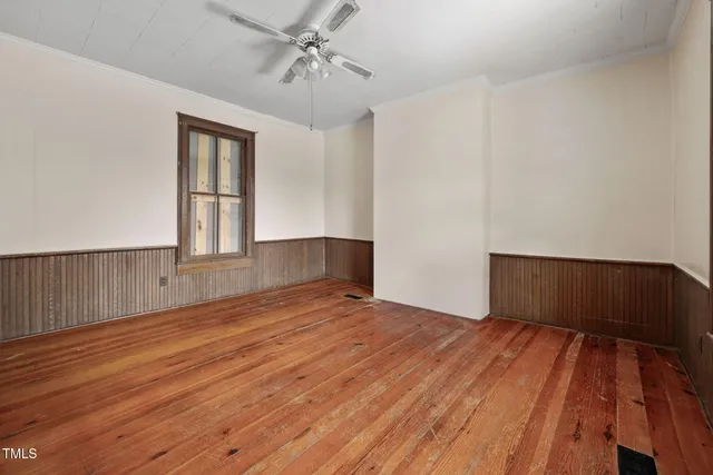 a view of an empty room and window