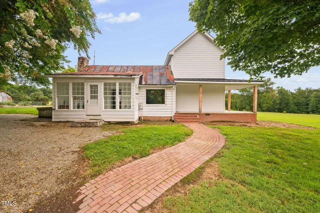 a house view with a outdoor space
