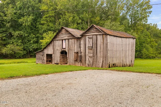 a view of a house with a big yard