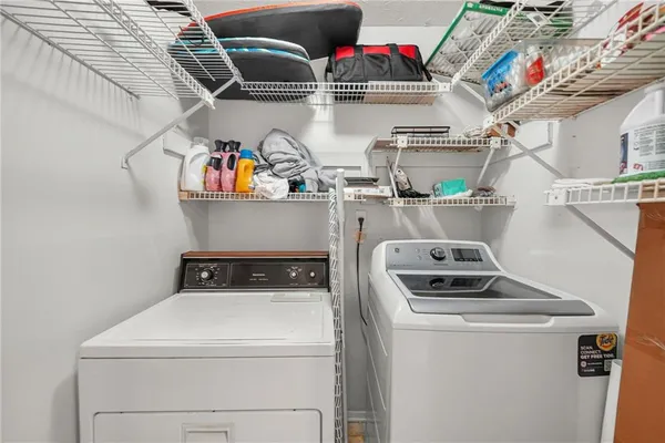 a utility room with dryer and washer