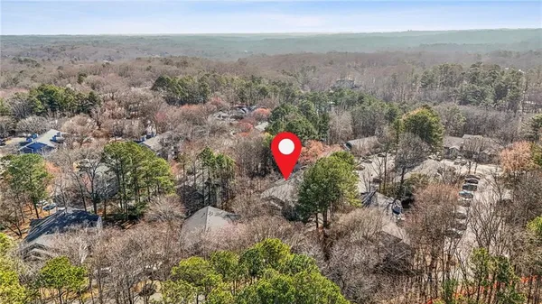 a view of a trees with yard