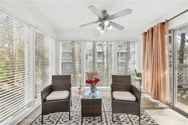 a living room with furniture and a window