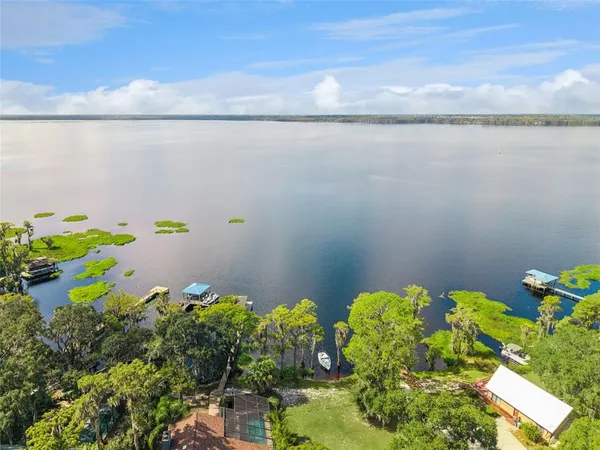 a view of a lake with a building in the background
