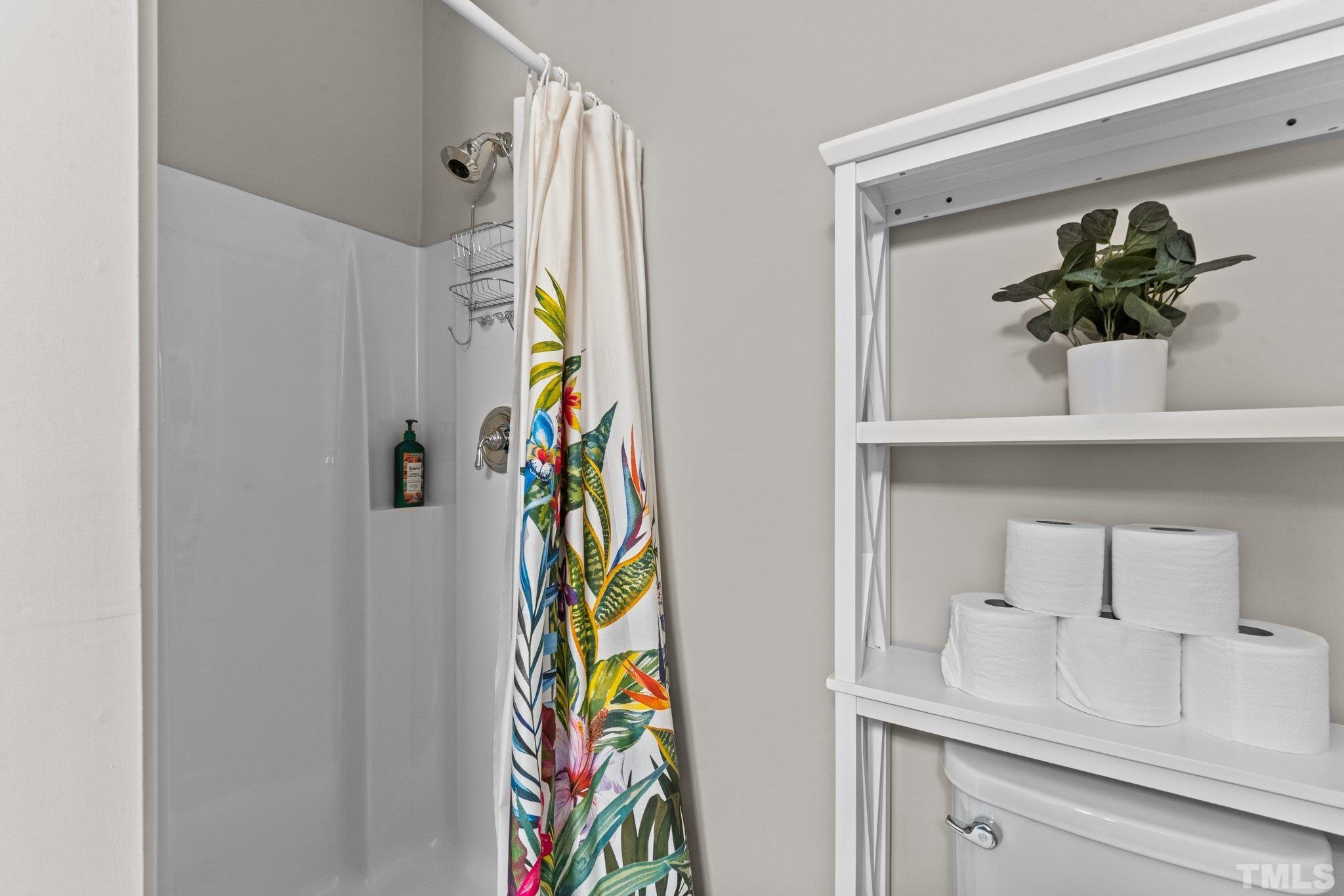 710 North Person Street, Unit 202 Raleigh, NC 27604 - Photo 26 of 33 a bathroom with a sink and a mirror
