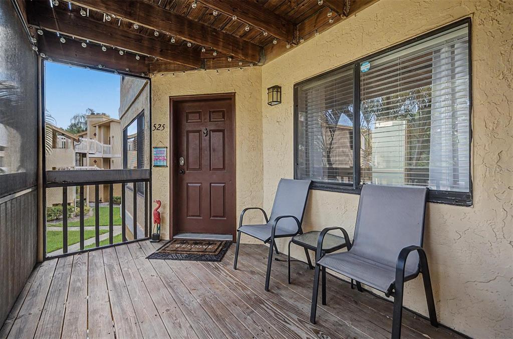 1550 South Belcher Road, Unit 525 Clearwater, FL 33764 - Photo 3 of 28 a view of a balcony with furniture