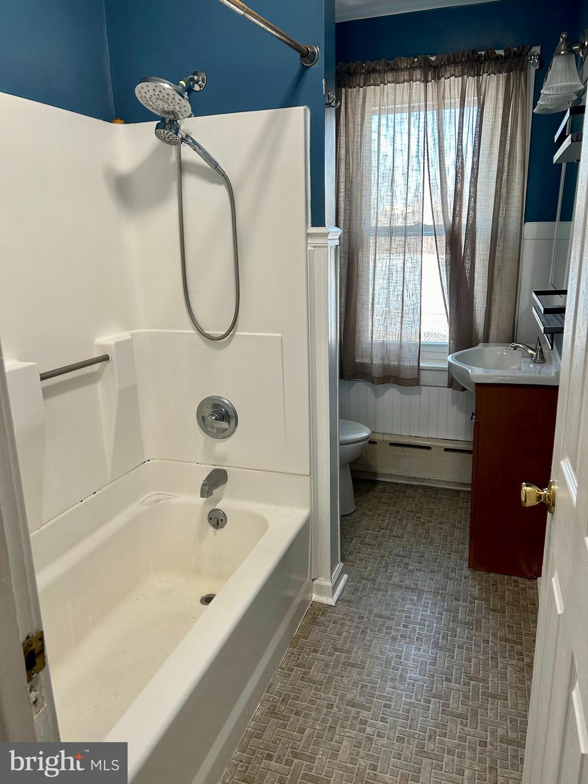 133 East Main Street Pottstown, PA 19465 - Photo 14 of 23 a bathroom with a tub sink and mirror