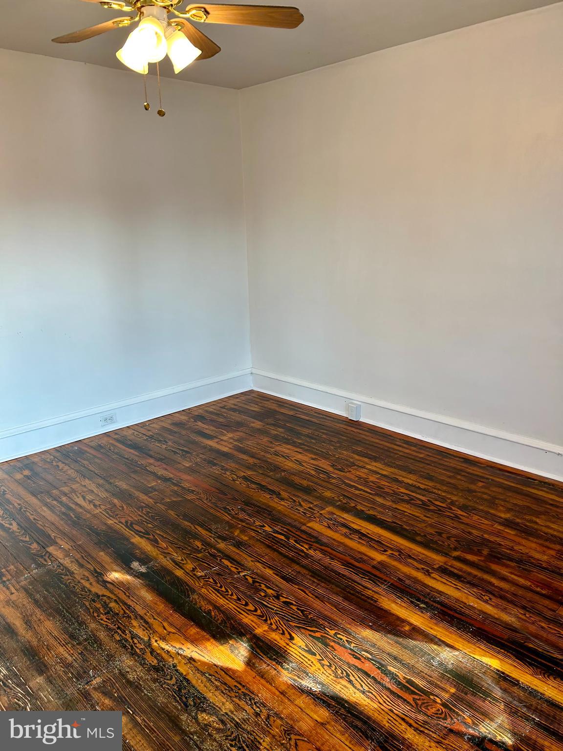 133 East Main Street Pottstown, PA 19465 - Photo 16 of 23 a view of empty room with wooden floor