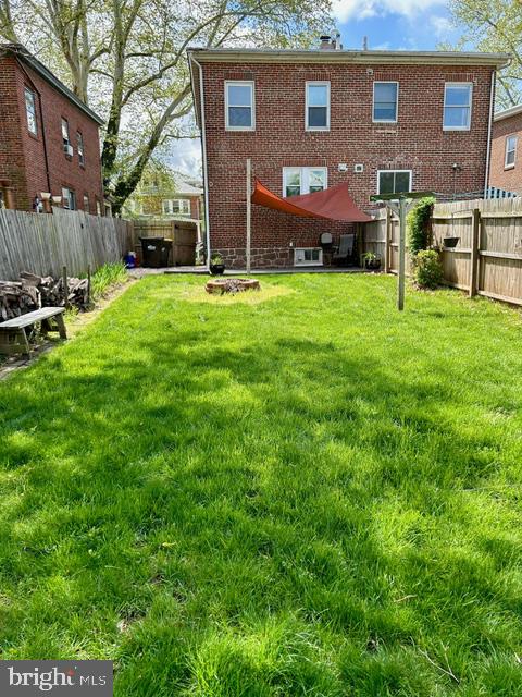 133 East Main Street Pottstown, PA 19465 - Photo 20 of 23 a front view of brick house with a yard