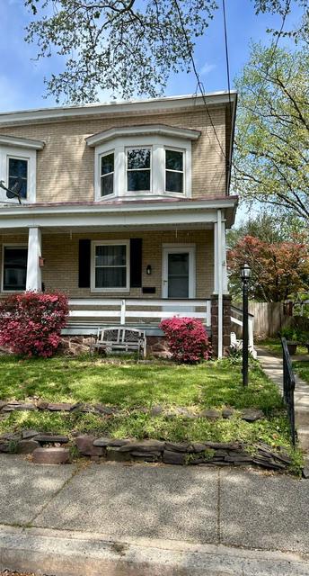 133 East Main Street Pottstown, PA 19465 - Photo 2 of 23 a front view of a house with garden