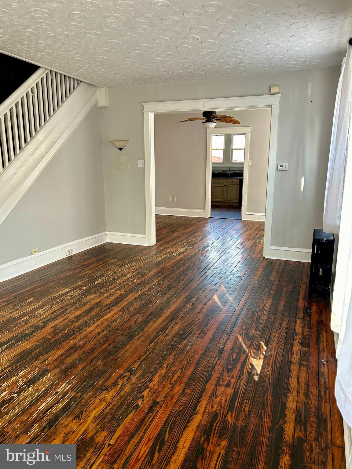 133 East Main Street Pottstown, PA 19465 - Photo 3 of 23 wooden floor in an empty room with wooden floor
