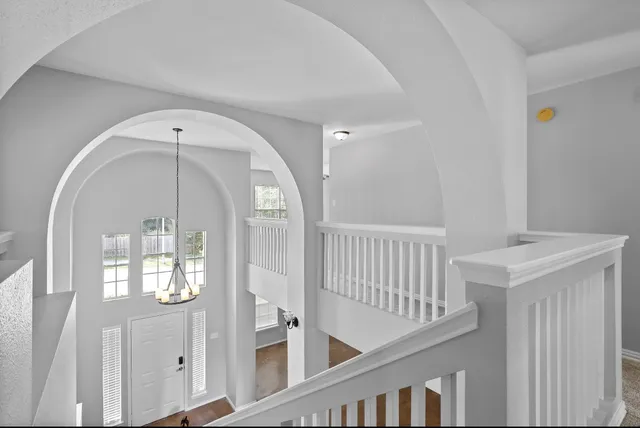 a view of a hallway with entryway