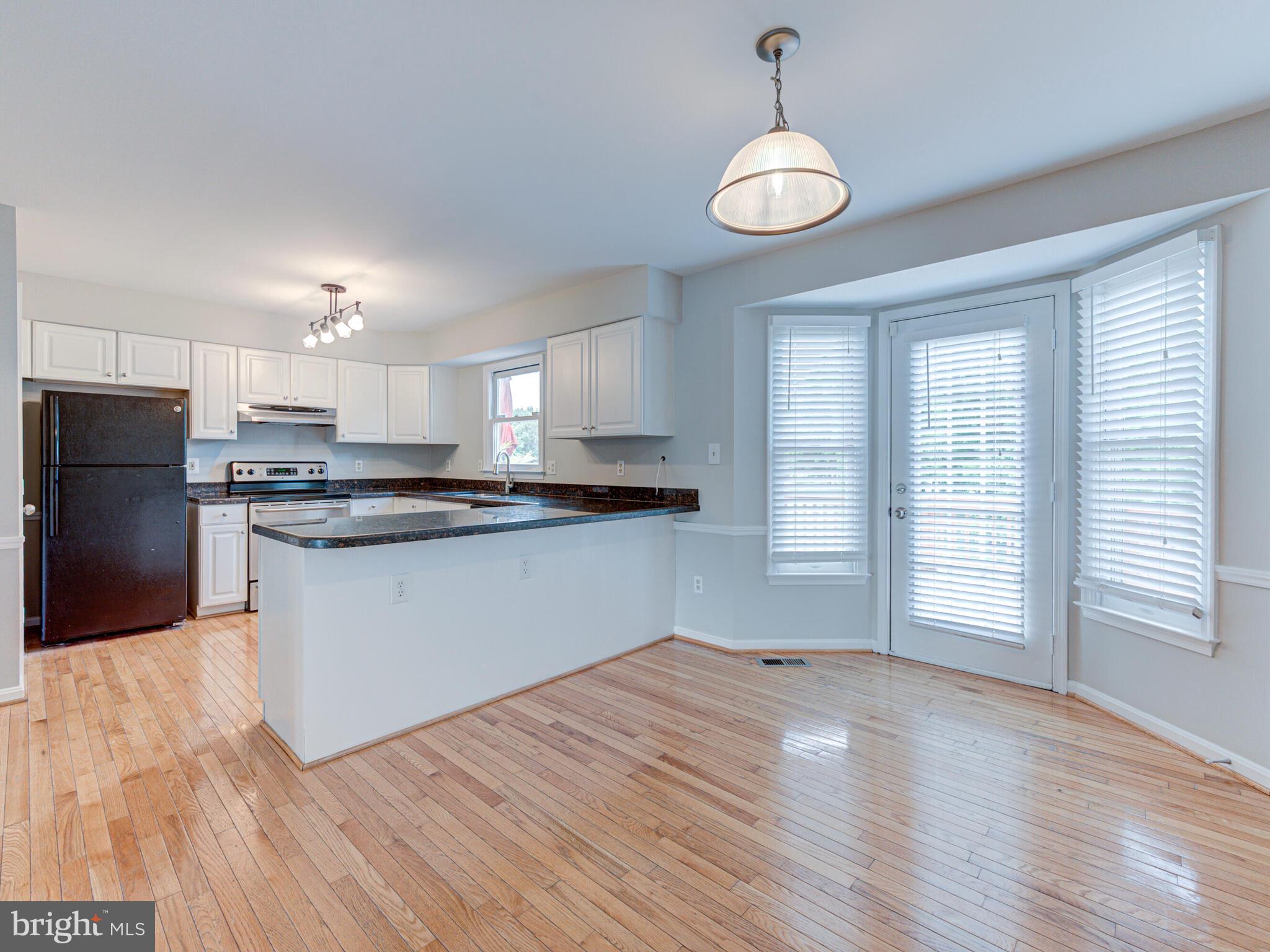 21140 Dray Terrace Ashburn, VA 20147 - Photo 11 of 59 Hardwoods in the Sunny Kitchen & Breakfast Room