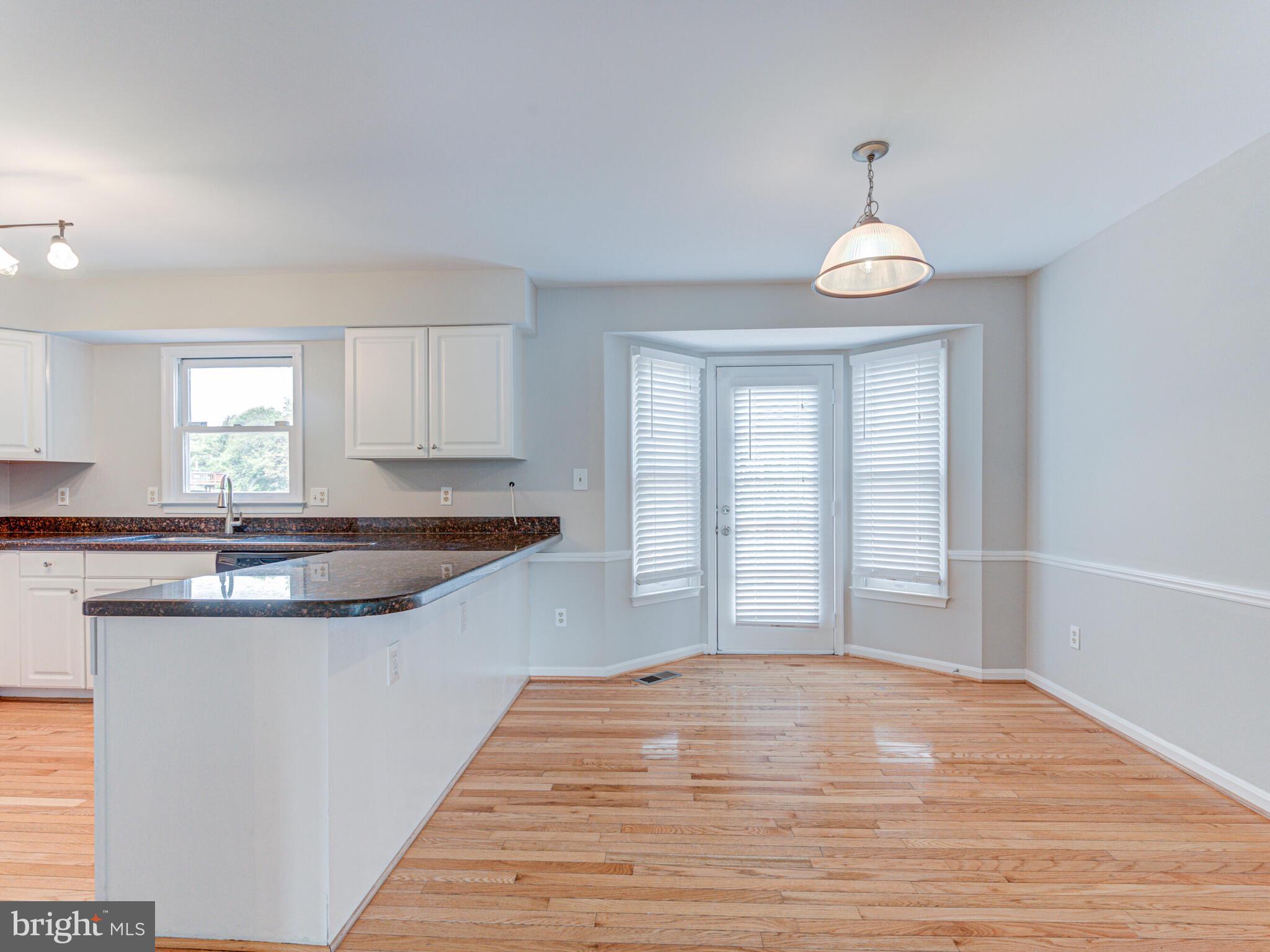 21140 Dray Terrace Ashburn, VA 20147 - Photo 12 of 59 Plenty of Room for Barstools & Full Sized Table