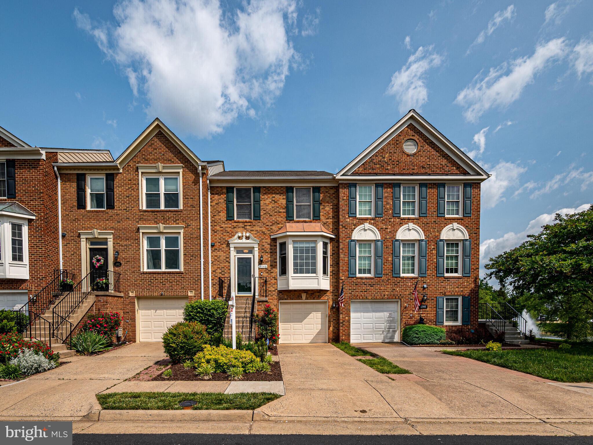 21140 Dray Terrace Ashburn, VA 20147 - Photo 2 of 59 Brick Front Townhome backing to Pond & Common Area