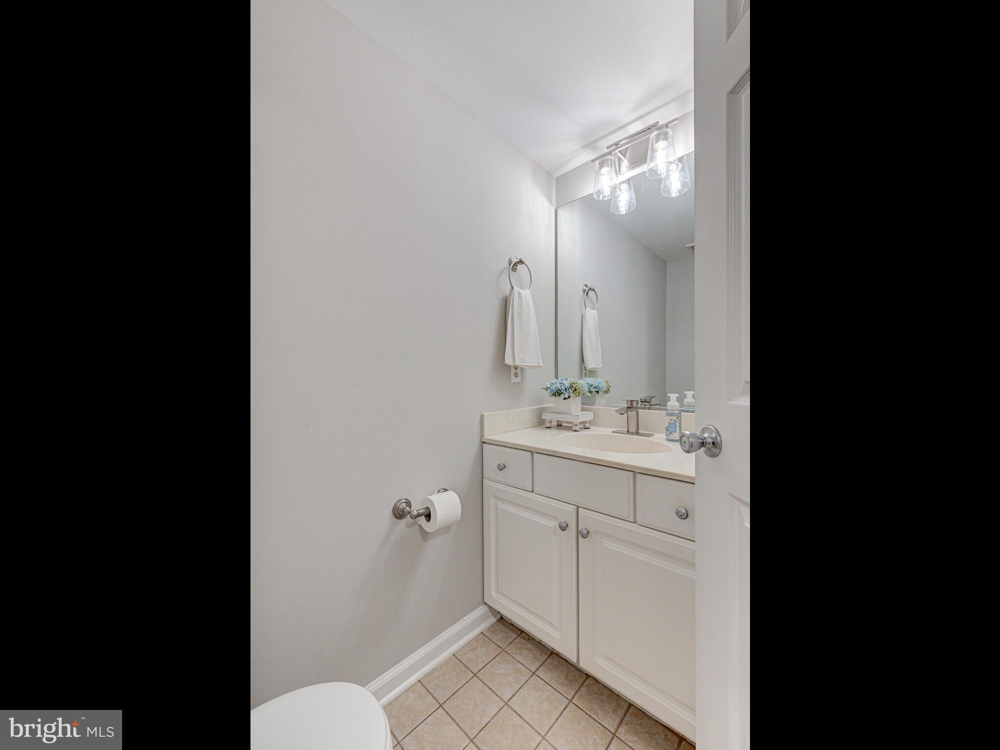 21140 Dray Terrace Ashburn, VA 20147 - Photo 45 of 59 Half Bath off Rec Rm and Garage Entrance