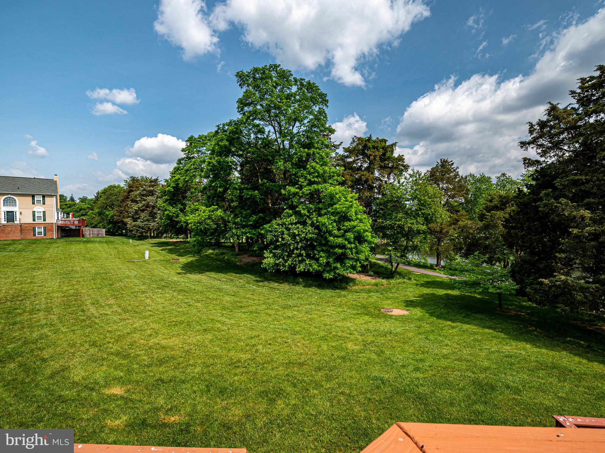 21140 Dray Terrace Ashburn, VA 20147 - Photo 50 of 59 Spacious Common Area leads to Trail, Pond & Park
