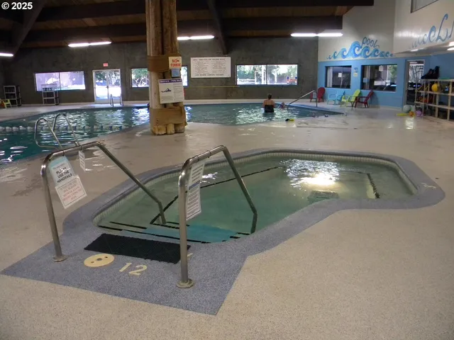 a view of a swimming pool and outdoor space