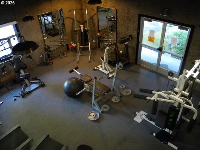 a view of a room with gym equipment