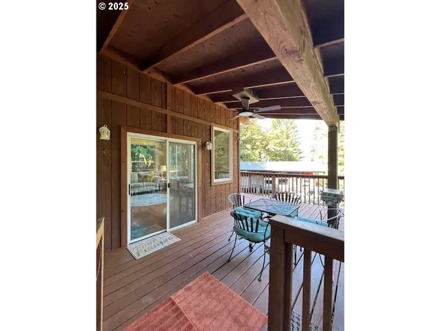a balcony with wooden floor
