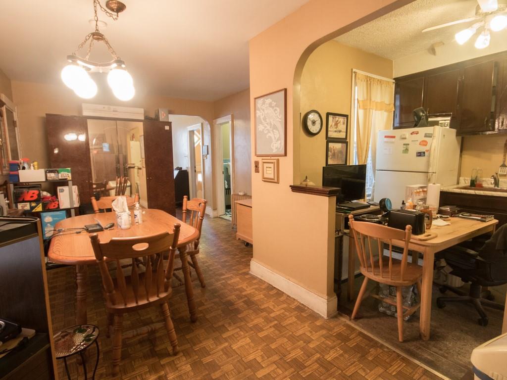 426 Ave Y Brooklyn, NY 11223 - Photo 18 of 25 a view of a dining room with furniture