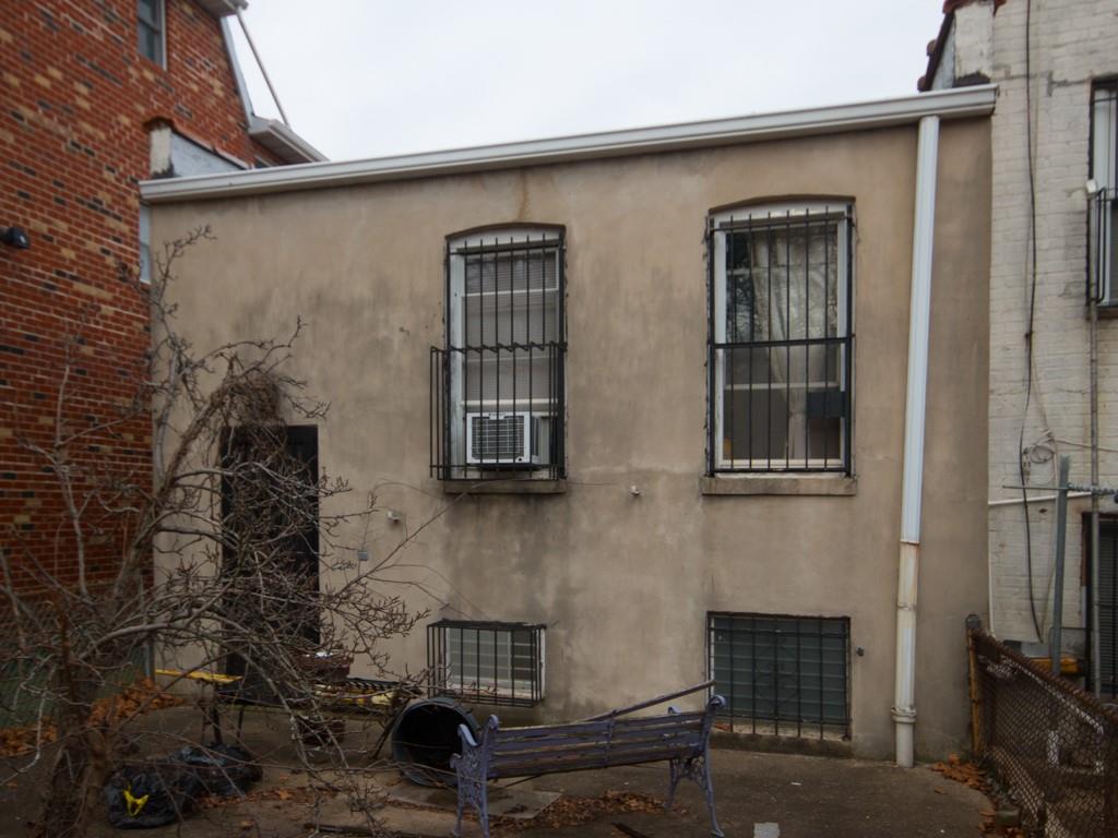 426 Ave Y Brooklyn, NY 11223 - Photo 24 of 25 a front view of a house with a yard