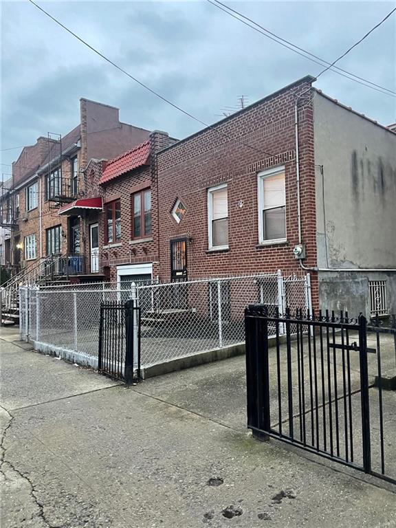 426 Ave Y Brooklyn, NY 11223 - Photo 25 of 25 a front view of a house with a garage