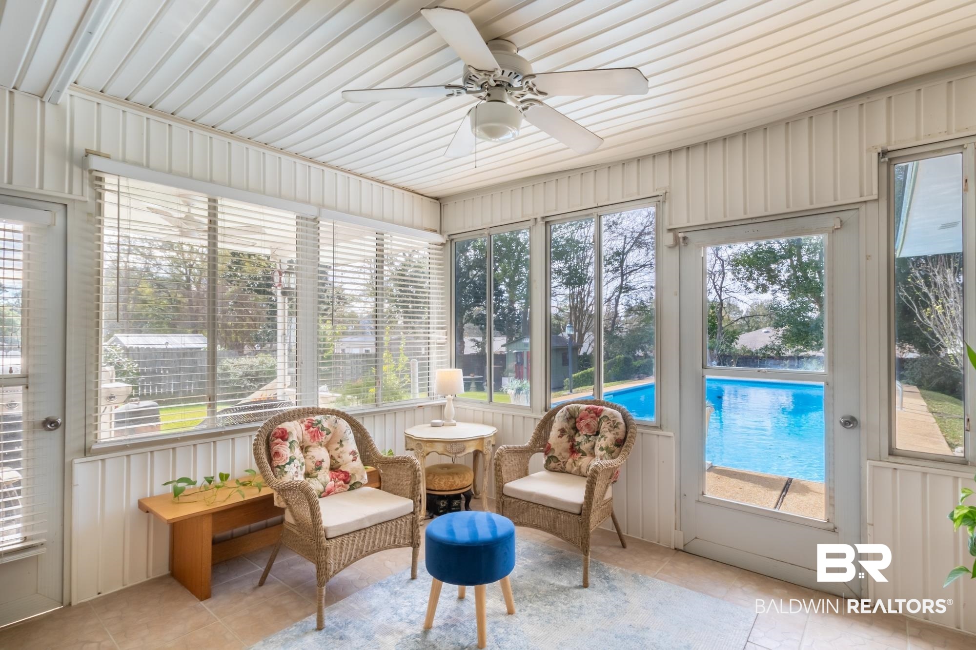 556 Stuart Street Daphne, AL 36526 - Photo 8 of 25 Sunroom with ceiling fan and a healthy amount of sunlight