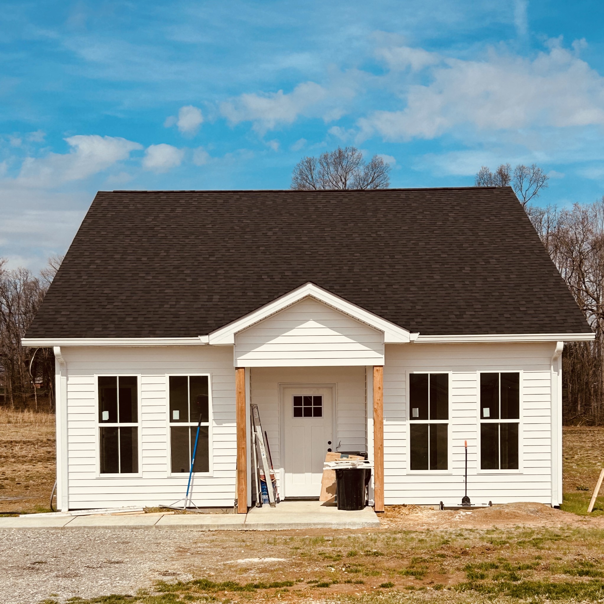 73 Henegar Road Morrison, TN 37357 - Photo 1 of 4 a front view of a house with a yard