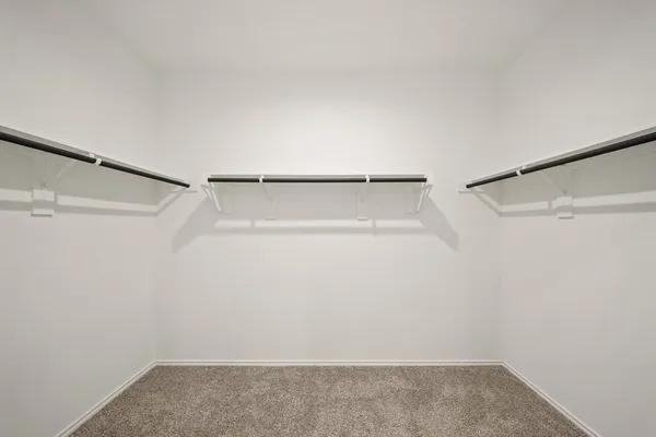 a view of a room with racks on the wall