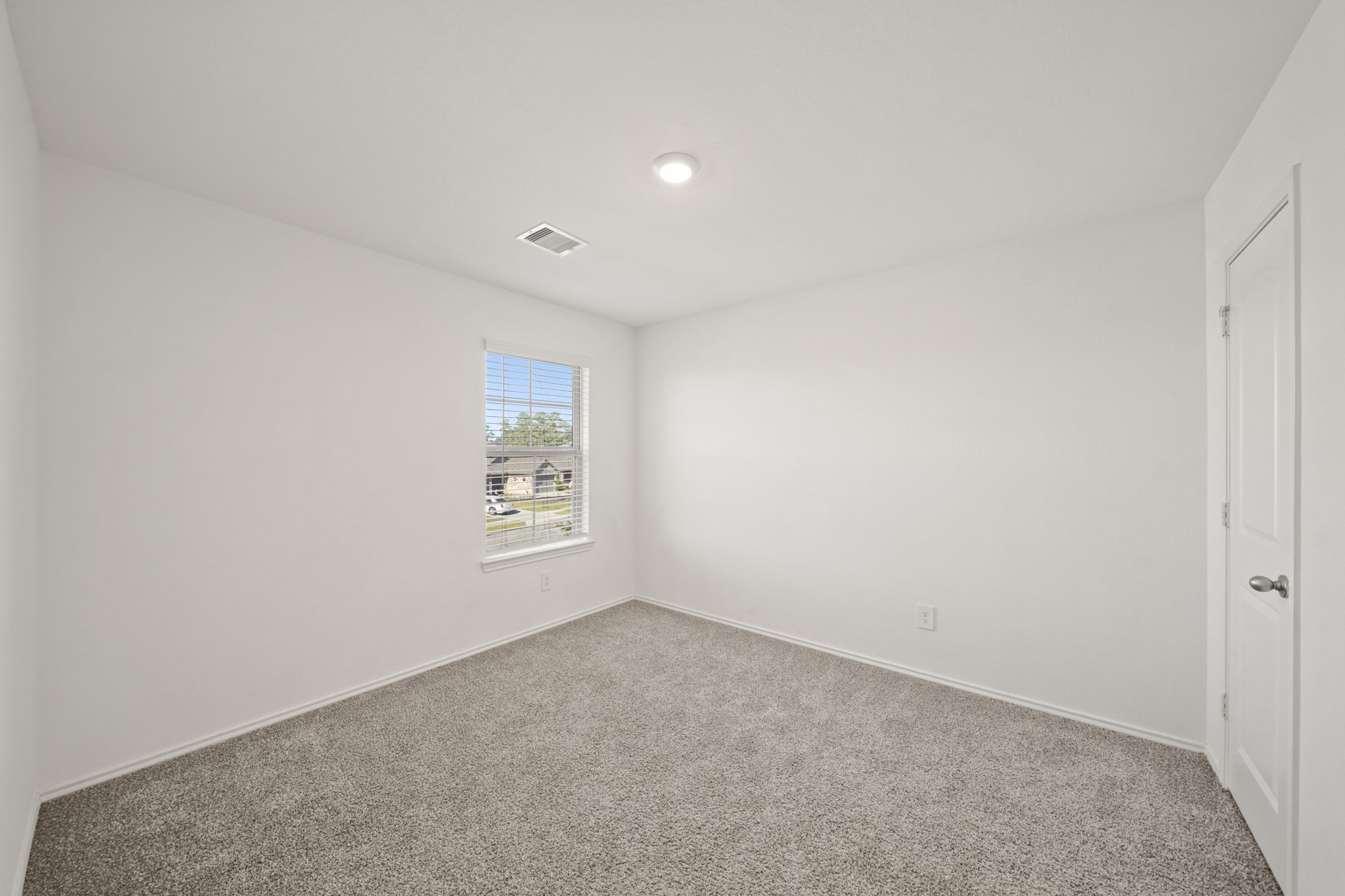 2406 Silver Prairie Ln Spring Spring, TX 77373 - Photo 21 of 30 an empty room with a window