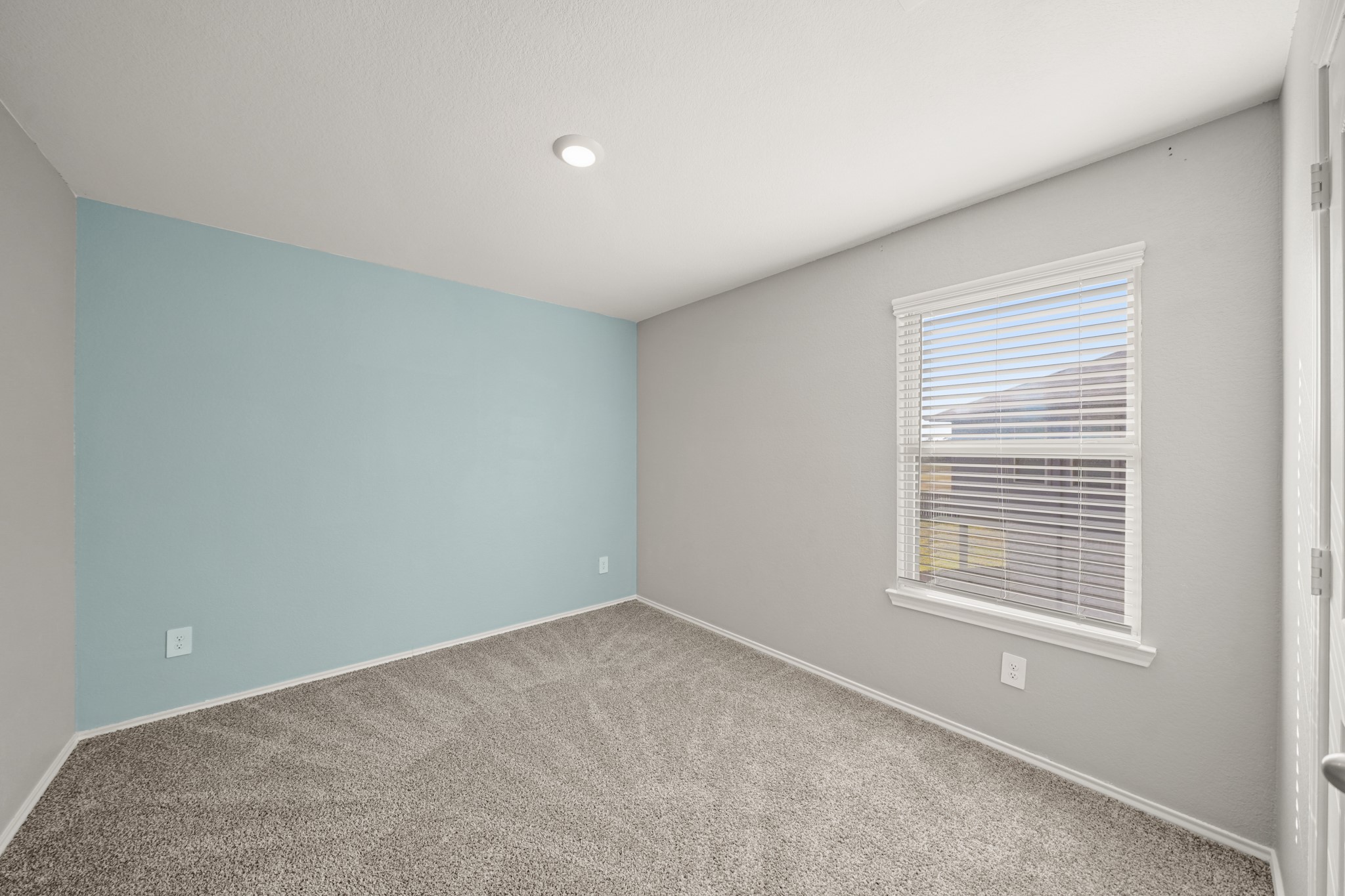 2406 Silver Prairie Ln Spring Spring, TX 77373 - Photo 22 of 30 a view of a room that has a window in it