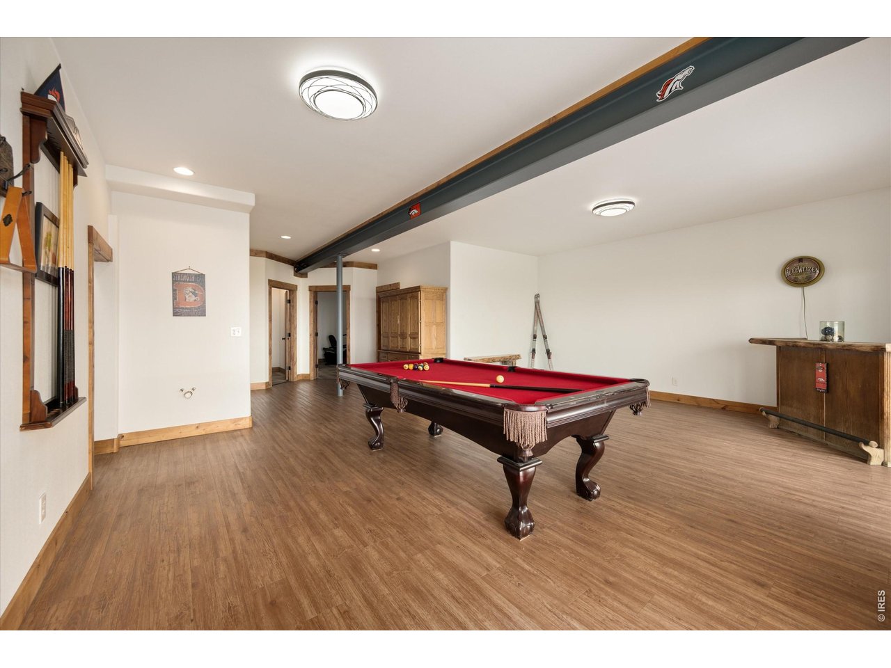 1291 Little Whale Road Bellvue, CO 80512 - Photo 24 of 43 Walk-out basement with pool table has plenty of space to make those hard shots