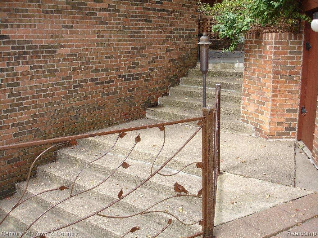 3755 West Pemberton Road Bloomfield Hills, MI 48302 - Photo 8 of 20 Stairway to Lower Patios
