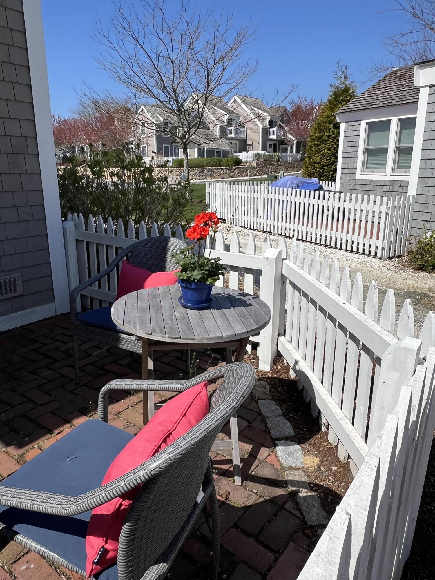 4 Race Point Road, Unit 4 Mashpee, MA 02649 - Photo 11 of 43 a outdoor space with furniture