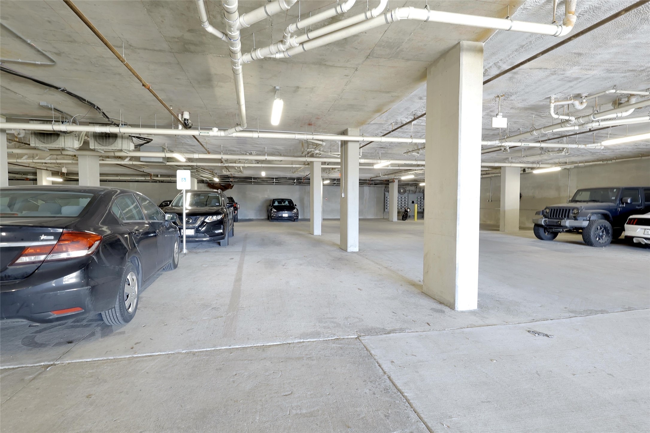2220 Webberville Road, Unit 303 Austin, TX 78702 - Photo 14 of 14 View of parking deck