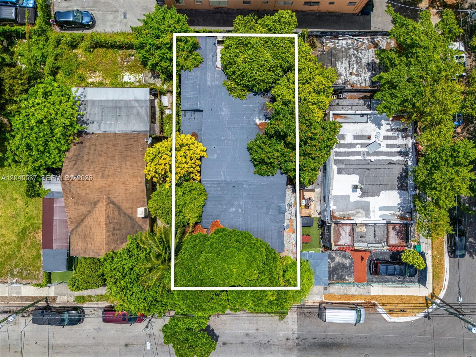 210 Southwest 13th Avenue Miami, FL 33135 - Photo 6 of 13 an aerial view of a house with a garden and plants