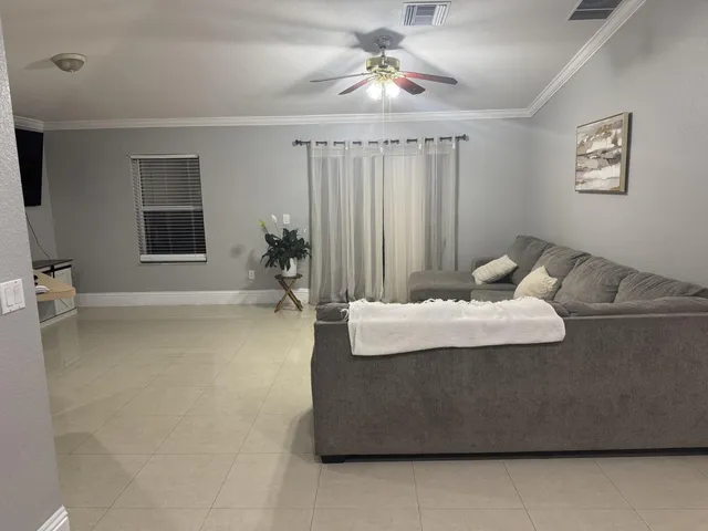 a bedroom with a bed and a stove