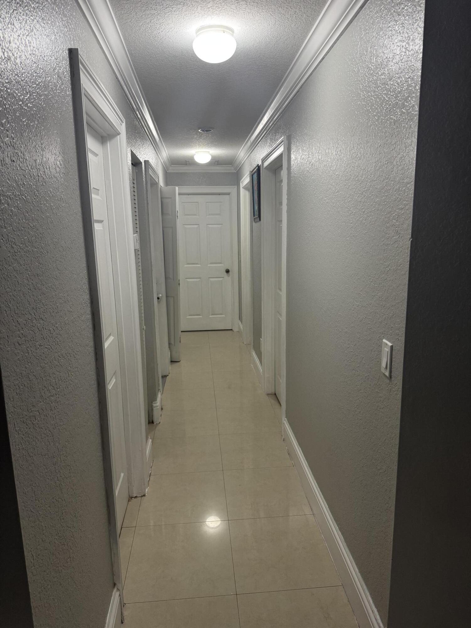 5621 Azalea Circle West Palm Beach, FL 33415 - Photo 18 of 20 a view of hallway