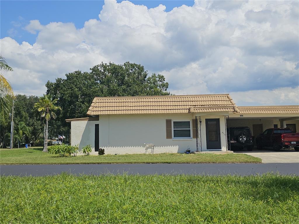 3956 Del Rio Avenue New Port Richey, FL 34655 - Photo 1 of 1 a front view of a house with garden