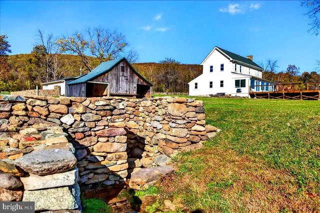 a kitchen with a sink and a microwave