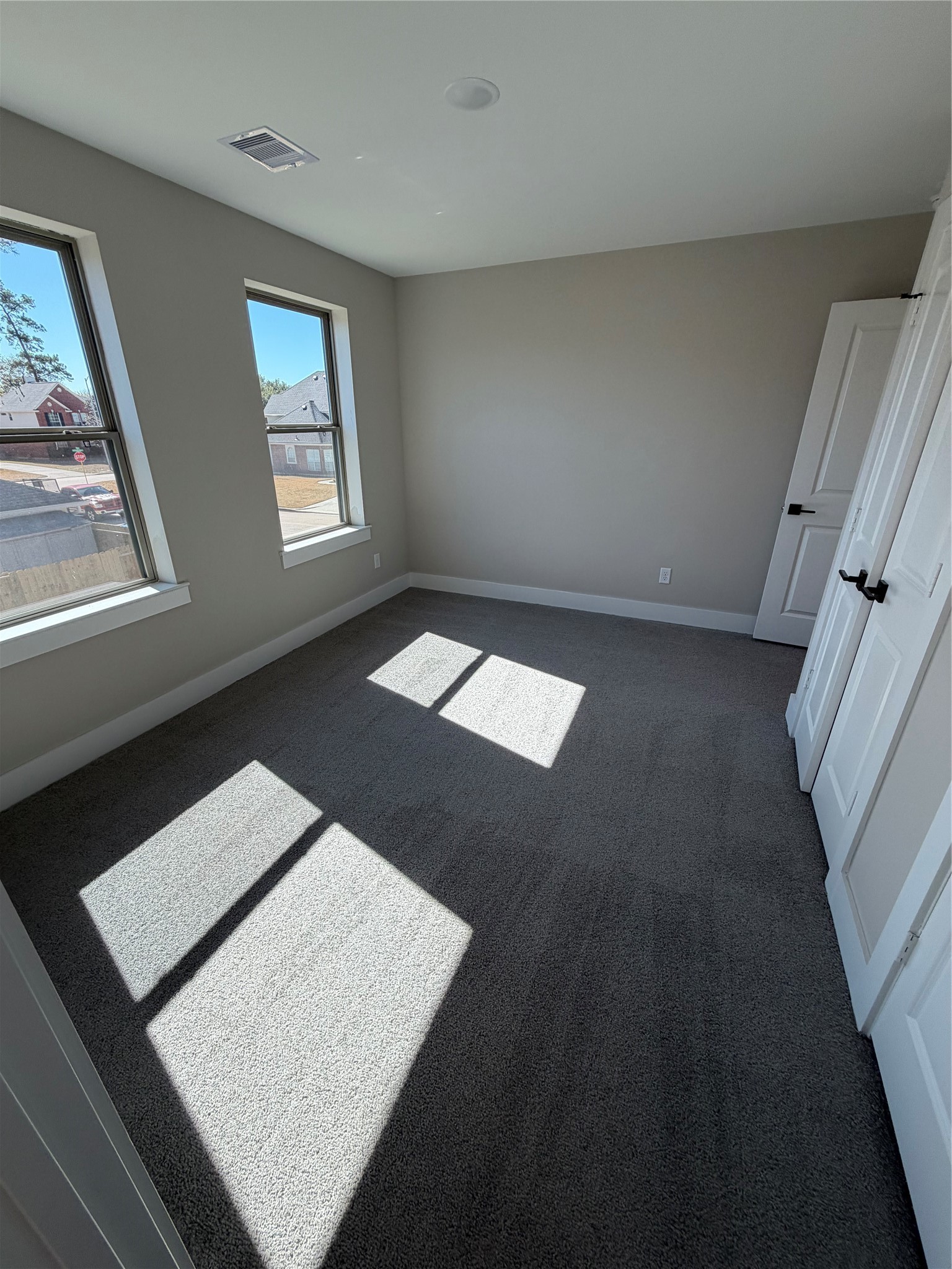 2523 Liguria Lane Spring, TX 77388 - Photo 20 of 30 a view of an empty room with windows