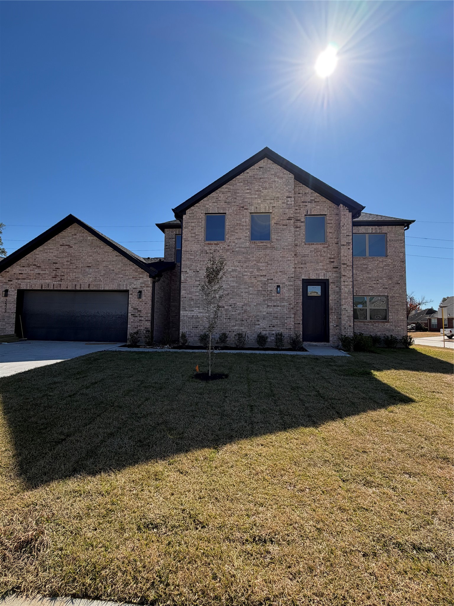 2523 Liguria Lane Spring, TX 77388 - Photo 2 of 30 a front view of a house with a yard