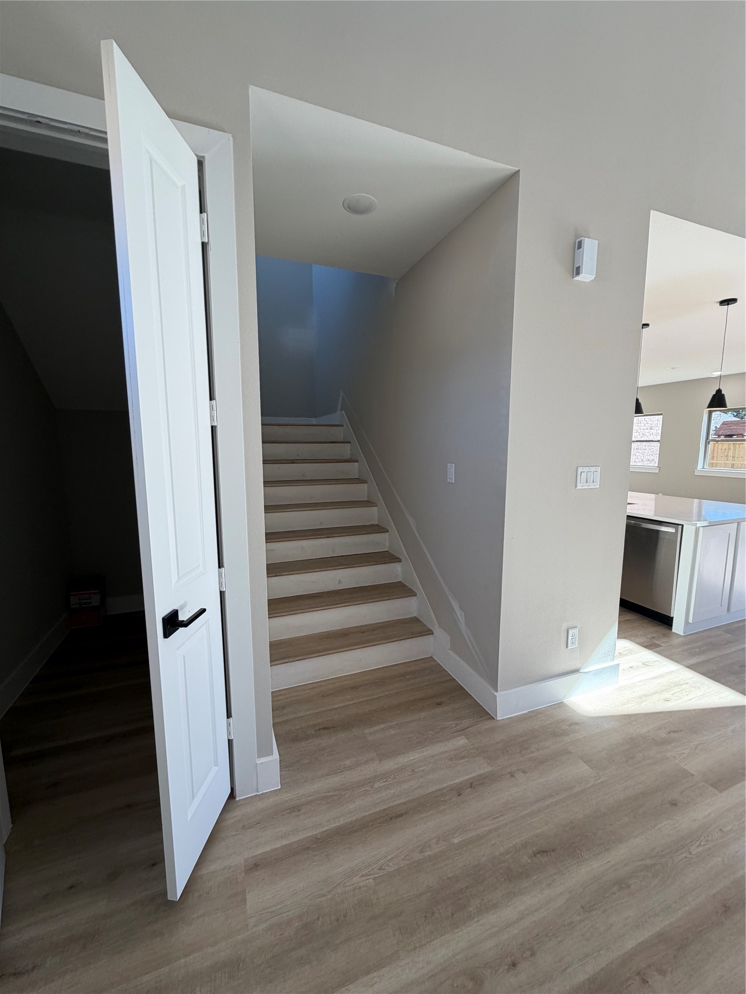 2523 Liguria Lane Spring, TX 77388 - Photo 6 of 30 a view of a livingroom with wooden floor and stairs