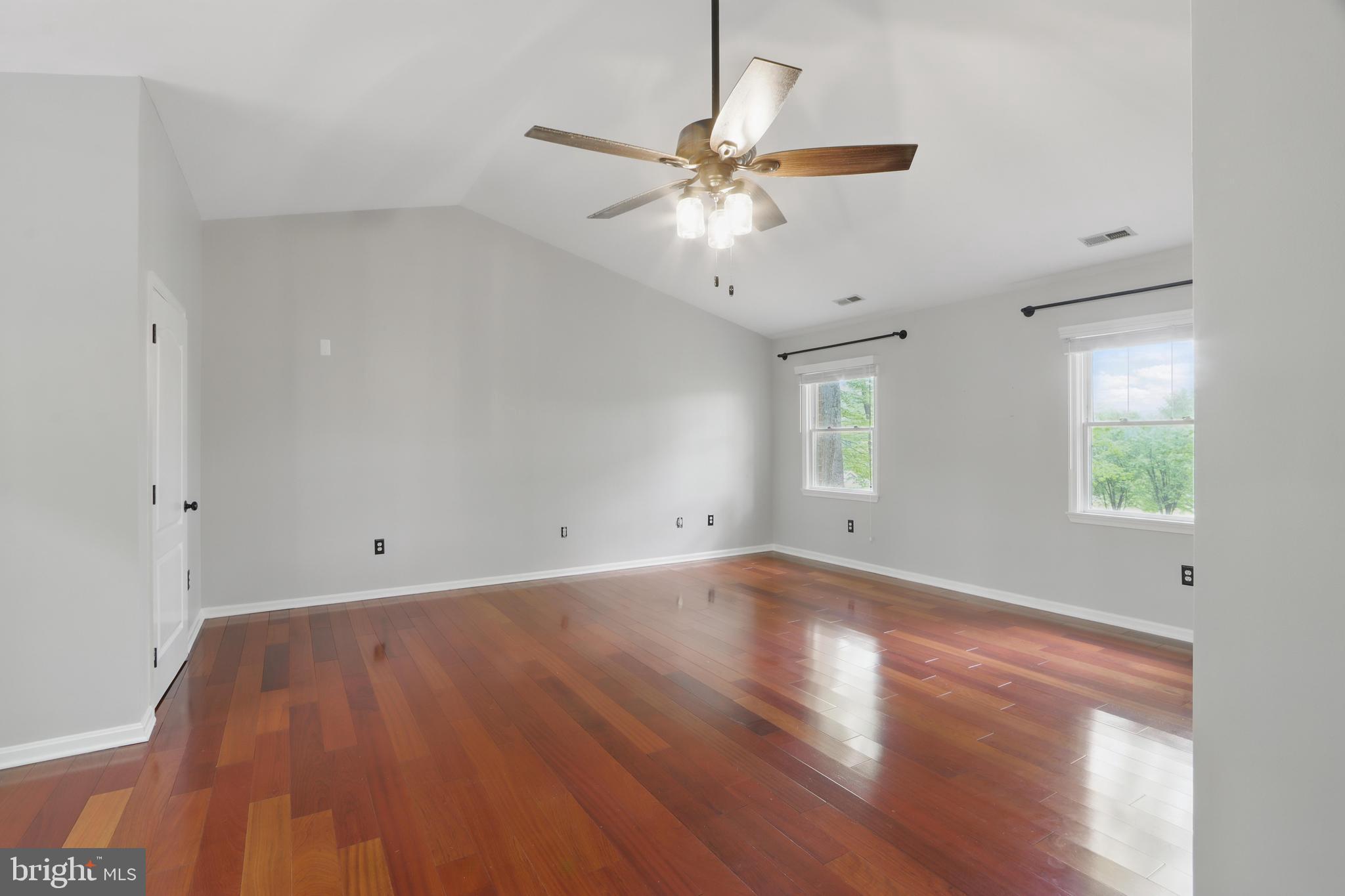 5185 Meadows Farm Road Lothian, MD 20711 - Photo 17 of 29 wooden floor in an empty room with a window