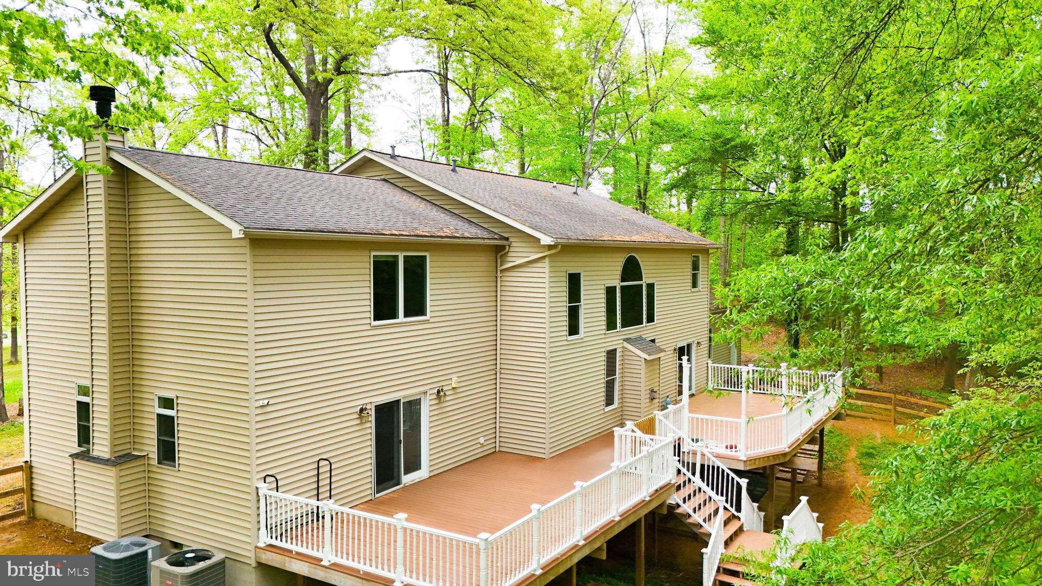 5185 Meadows Farm Road Lothian, MD 20711 - Photo 26 of 29 a backyard of a house with seating space