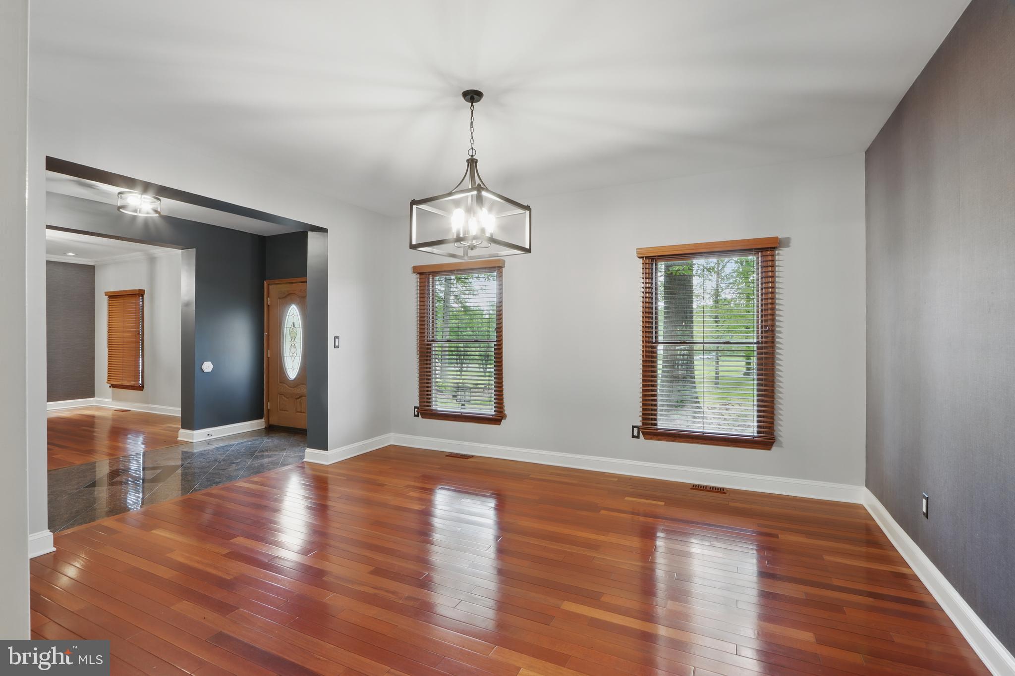 5185 Meadows Farm Road Lothian, MD 20711 - Photo 7 of 29 a view interior of a house with wooden floor and windows